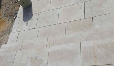 Terrassement d'une cour et pose d'enrobée dans une maison individuelle par un artisan vers Troyes 